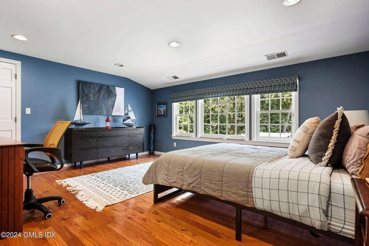 Nautical-Themed Bedroom with Eye-Catching Blue Walls