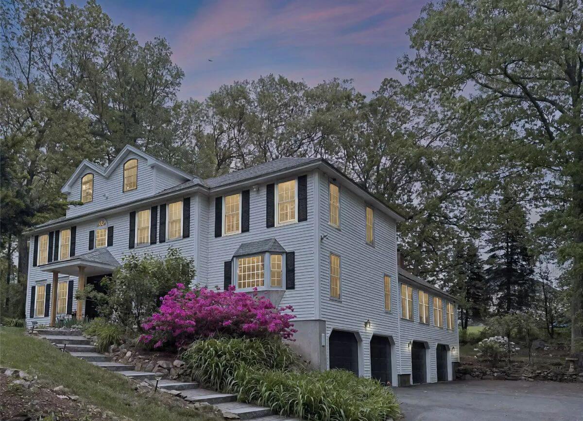 5-Bedroom Colonial Estate with Open-Concept Living and Drive-Under Garage (4,136 Sq. Ft. Floor Plan)