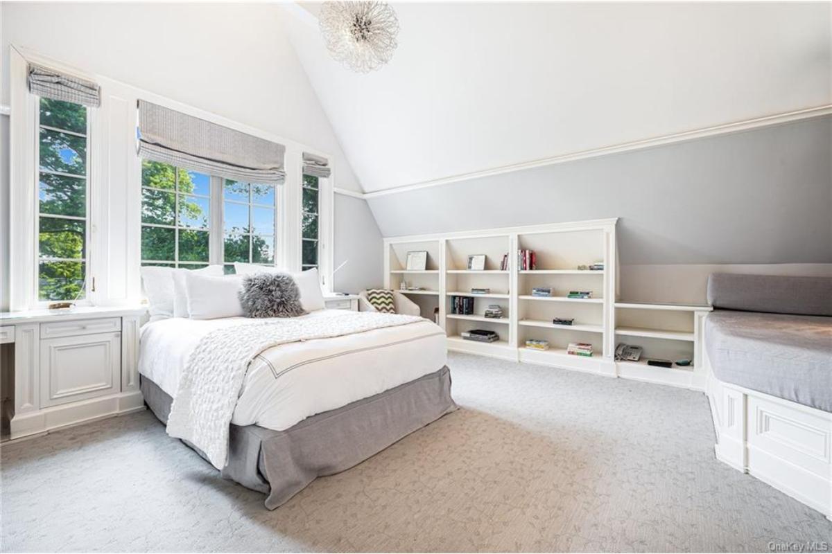 Spacious Bedroom with Built-In Shelves Promise Practical Elegance