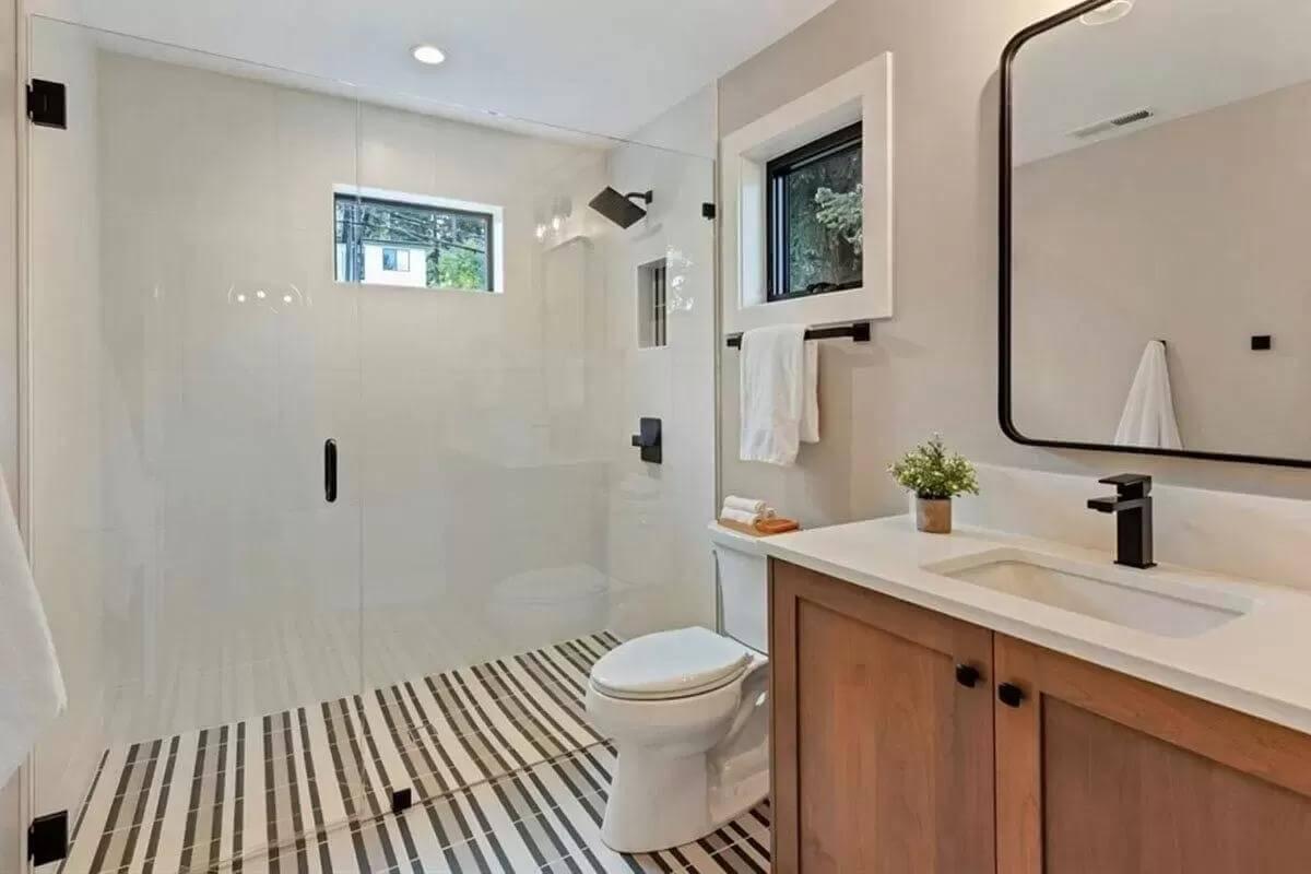 Check Out the Bold Striped Flooring in This Contemporary Bathroom
