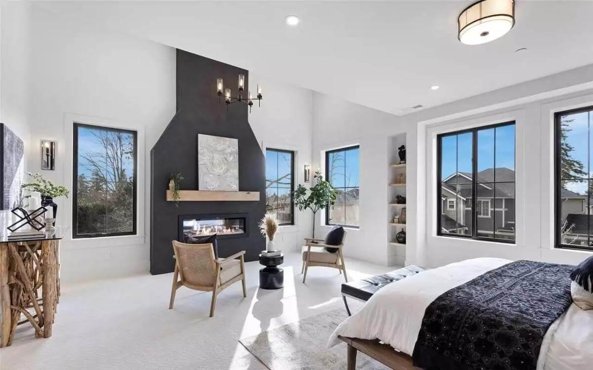 A Master Suite with Elevated Style Highlighted by a Bold Fireplace