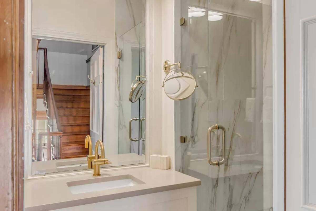 Elegant Bathroom Featuring Stunning Gold Fixtures