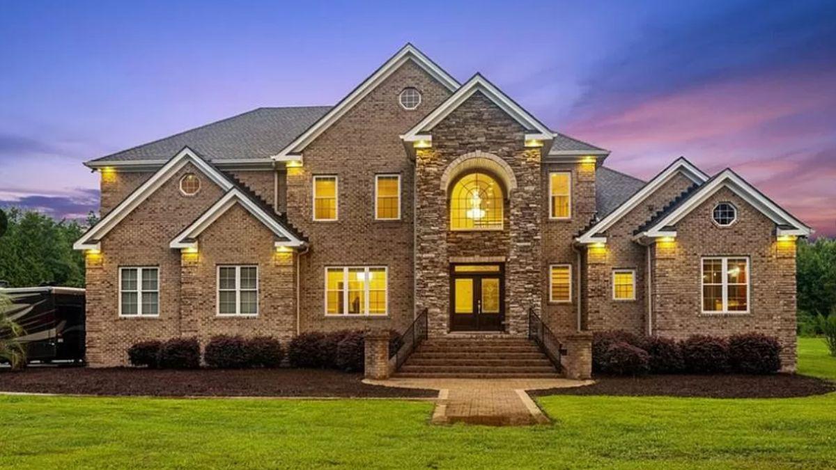 Notice the Striking Symmetry of This Brick Facade with Stone Accents
