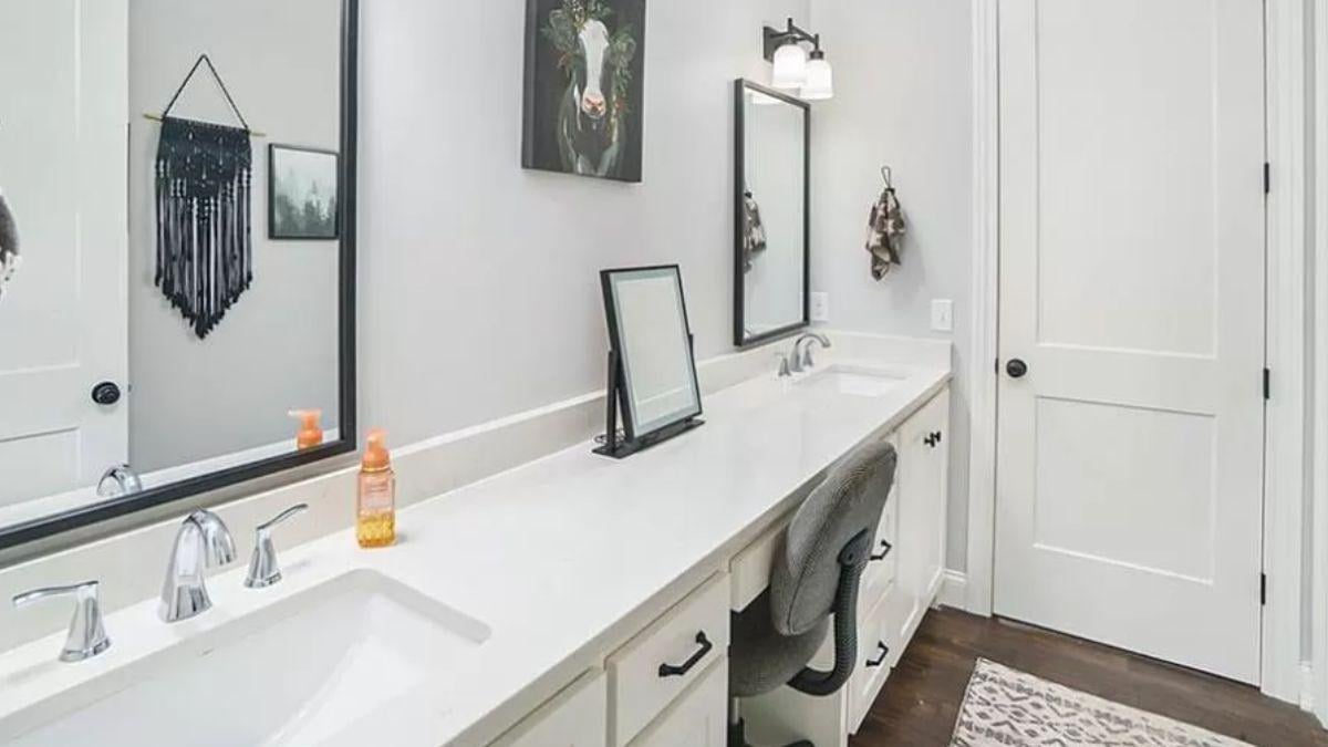 Dual Vanity Bathroom with Eclectic Wall Art