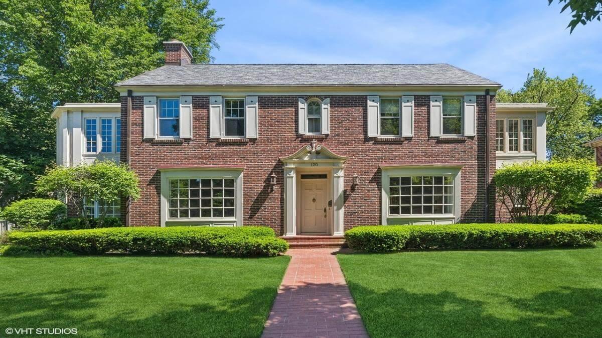 Symmetrical Brick Beauty with Timeless Shutters