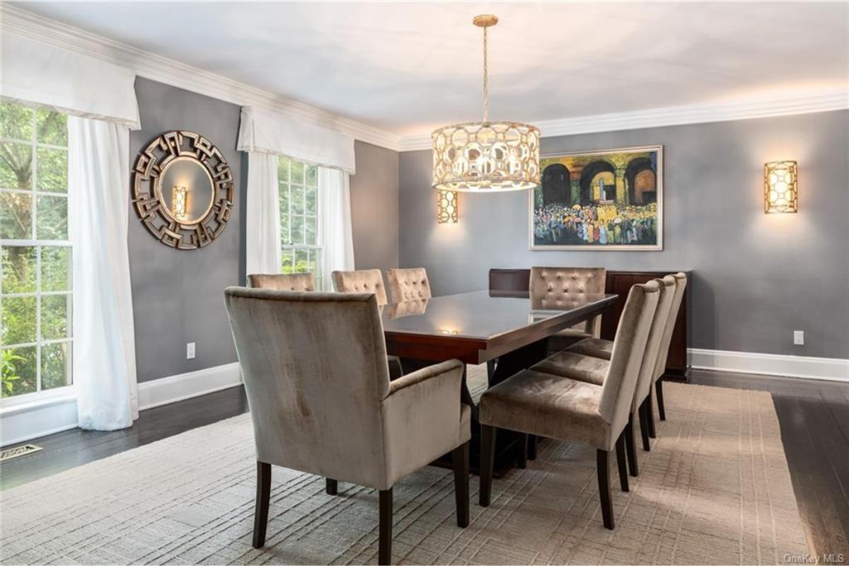 Elegant Dining Space with a Distinctive Mirrored Accent