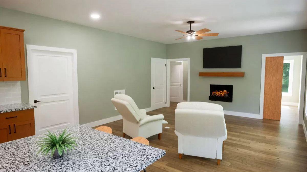 Cozy Living Area with a Chic Electric Fireplace and Granite Countertops