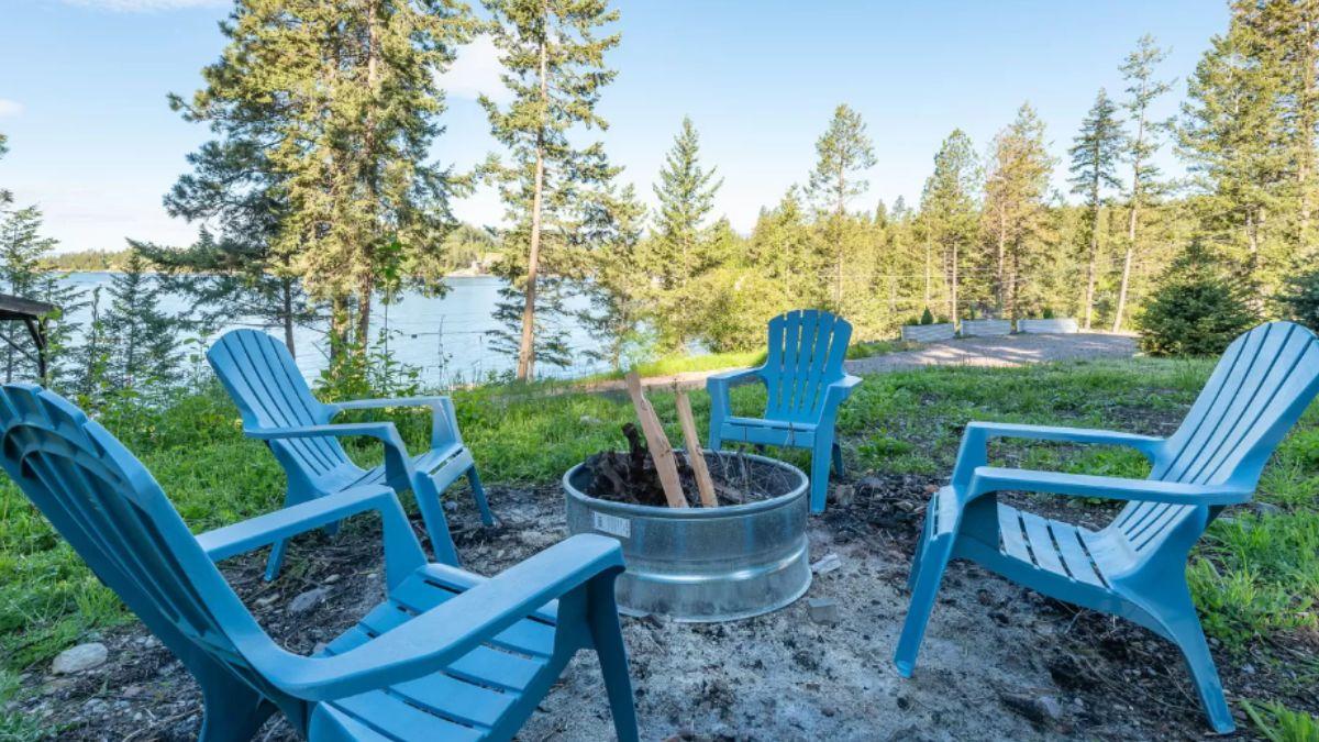 Gather Around This Cozy Lakeside Fire Pit