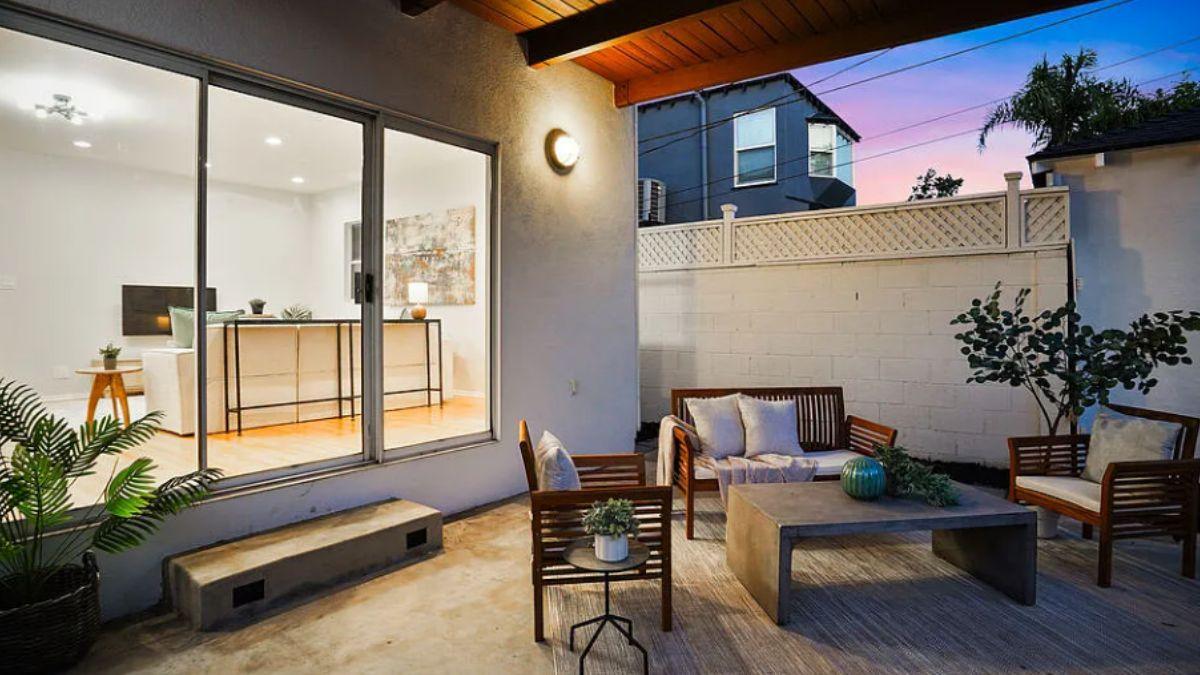 Cozy Patio Retreat with Slick Indoor-Outdoor Flow