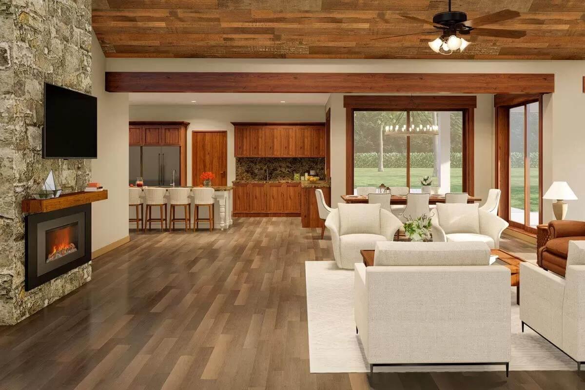 Warm Craftsmanship in the Great Room Featuring a Stone Fireplace