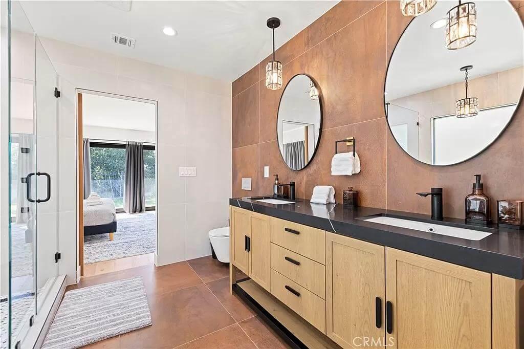 Double Vanity Delight with Wood Accents and Bold Black Fixtures
