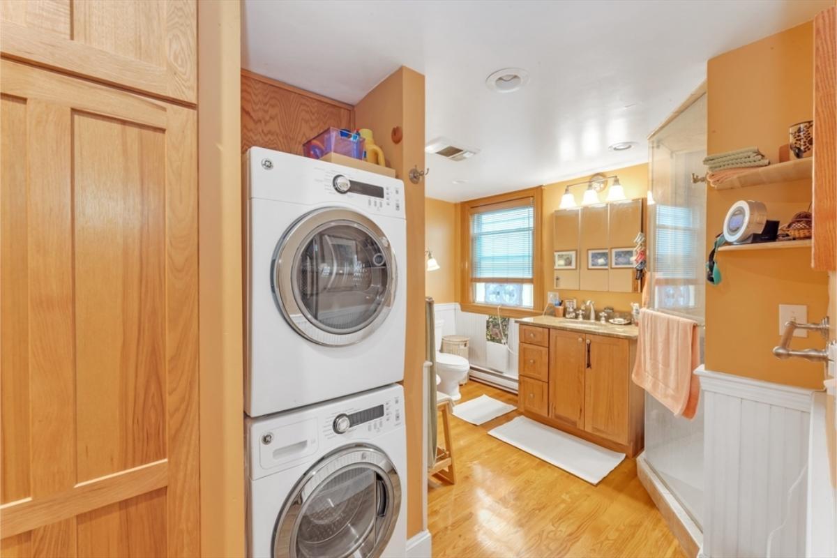 Dual Functionality in This Bathroom with Laundry Closet Combo
