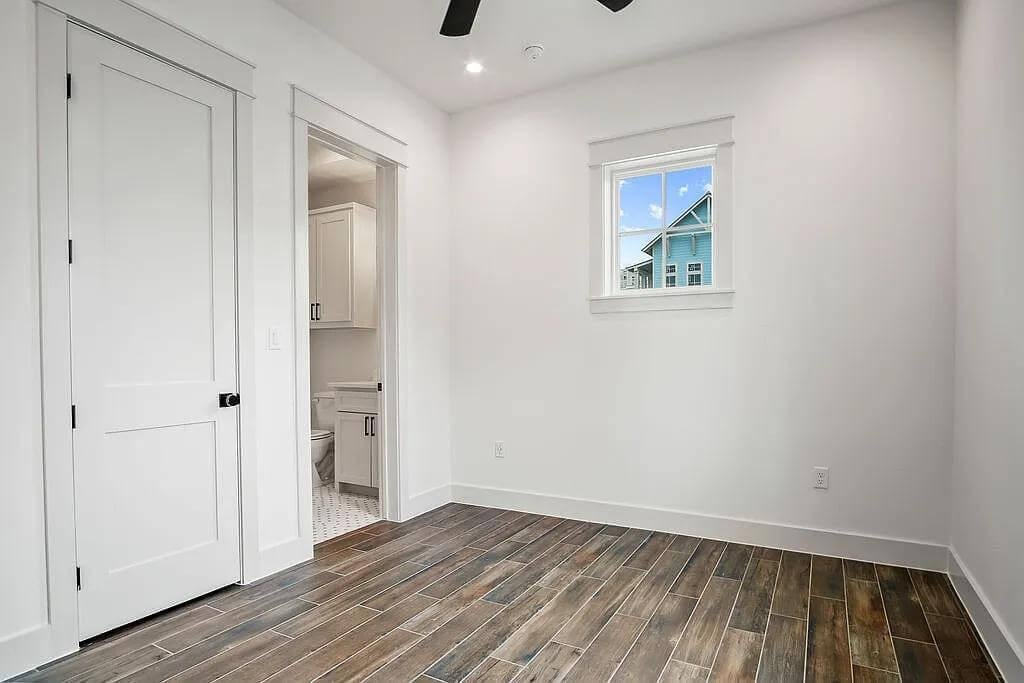 Simple Elegance in This Versatile Flex Space with Rich Wood Flooring