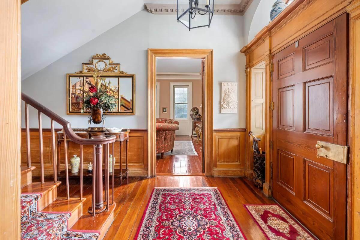Step Inside This Classic Foyer with Rich Wood Accents