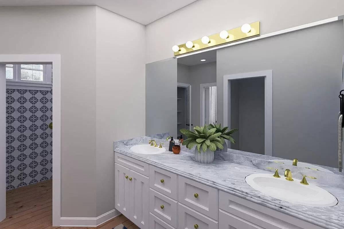 Wow, Look at These Marble Countertops and Patterned Tile in This Bathroom