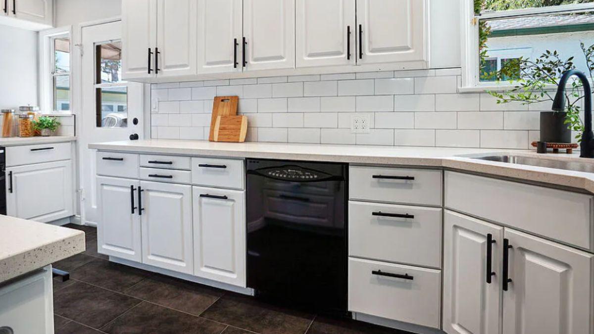 Notice the Crisp Black Hardware in This Clean White Kitchen
