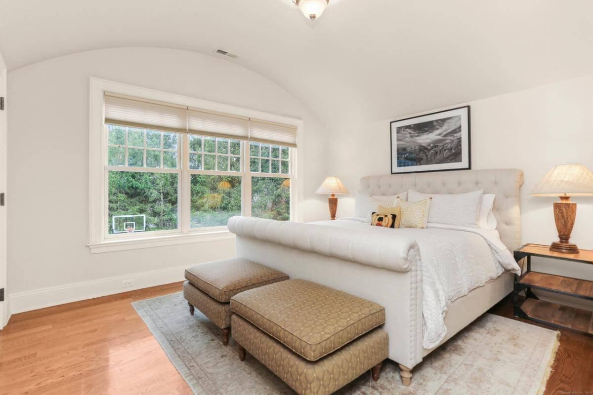 Elegant Craftsman Bedroom with Stylish Rolled Headboard