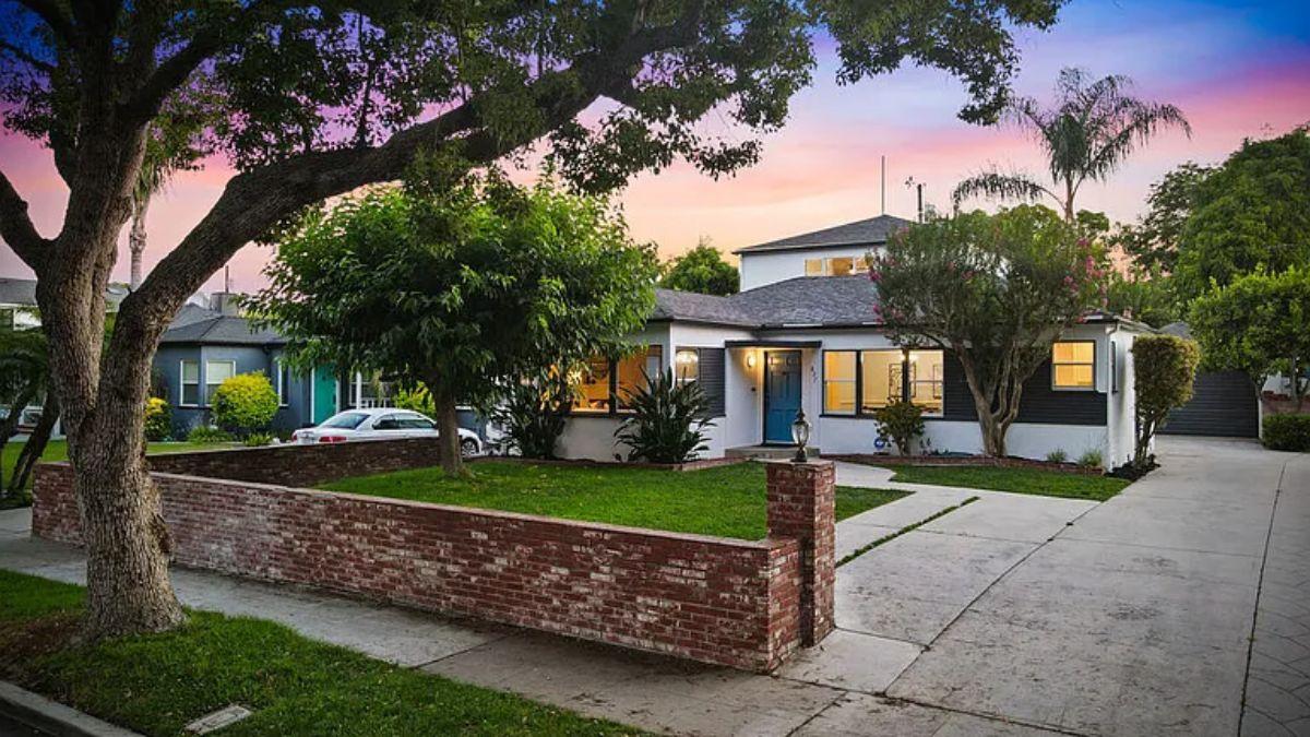 Charming Front Yard with a Distinct Blue Door
