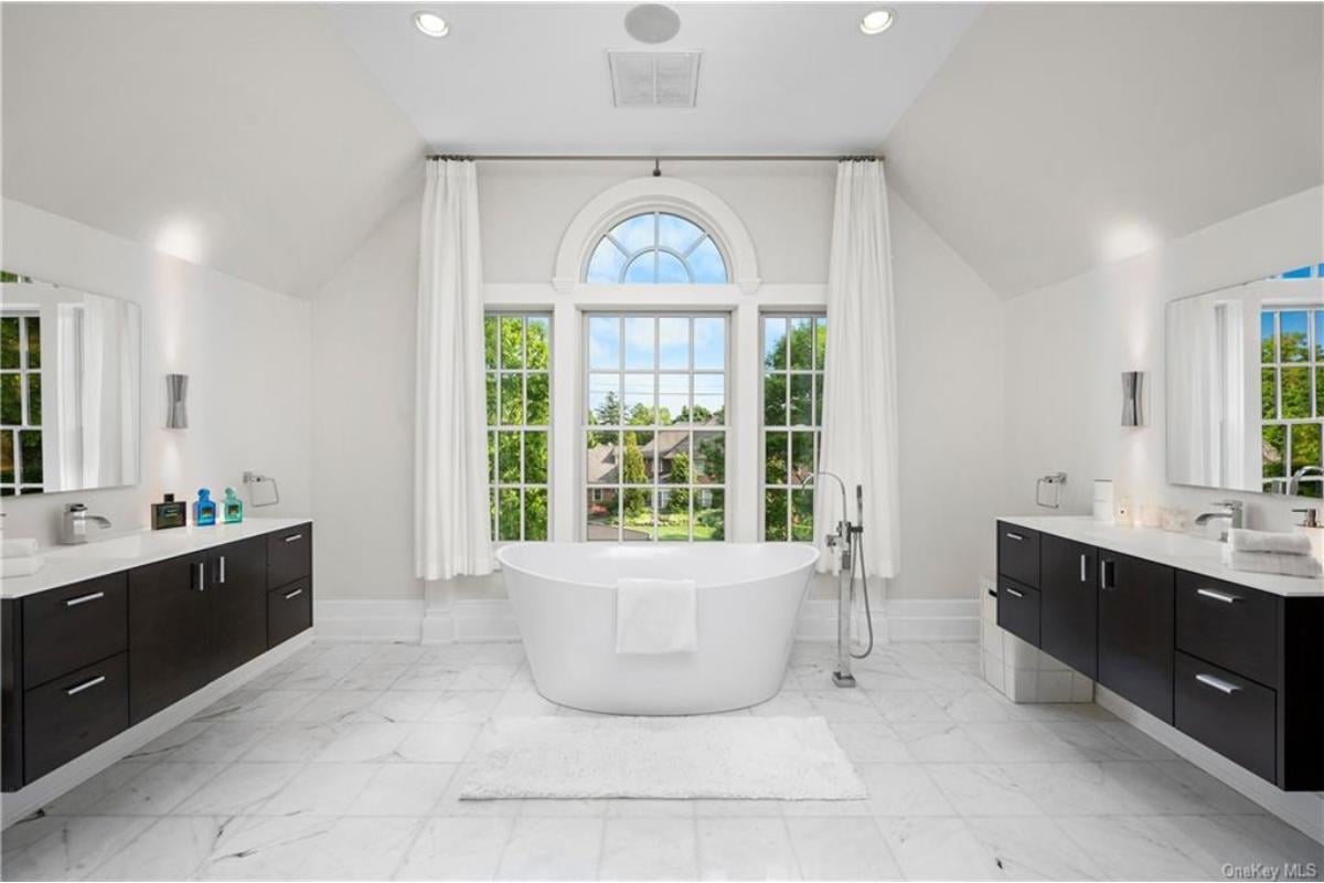 Wow, Take a Look at This Spacious Bathroom with a Freestanding Tub