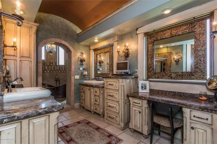 Elegant Bathroom with Richly Detailed Cabinets and Copper Accents