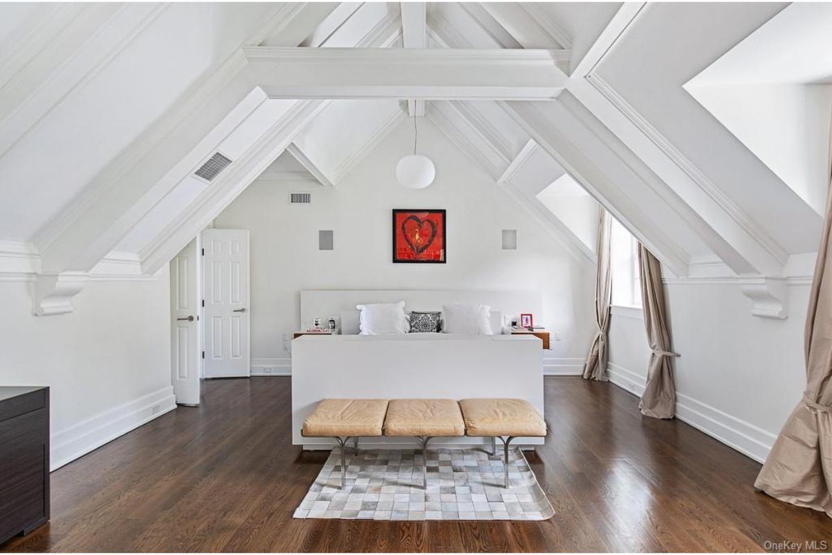 Check Out the Vaulted Ceilings in This Bright Bedroom