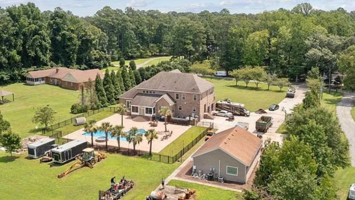 Check Out This Brick Home with a Poolside Patio