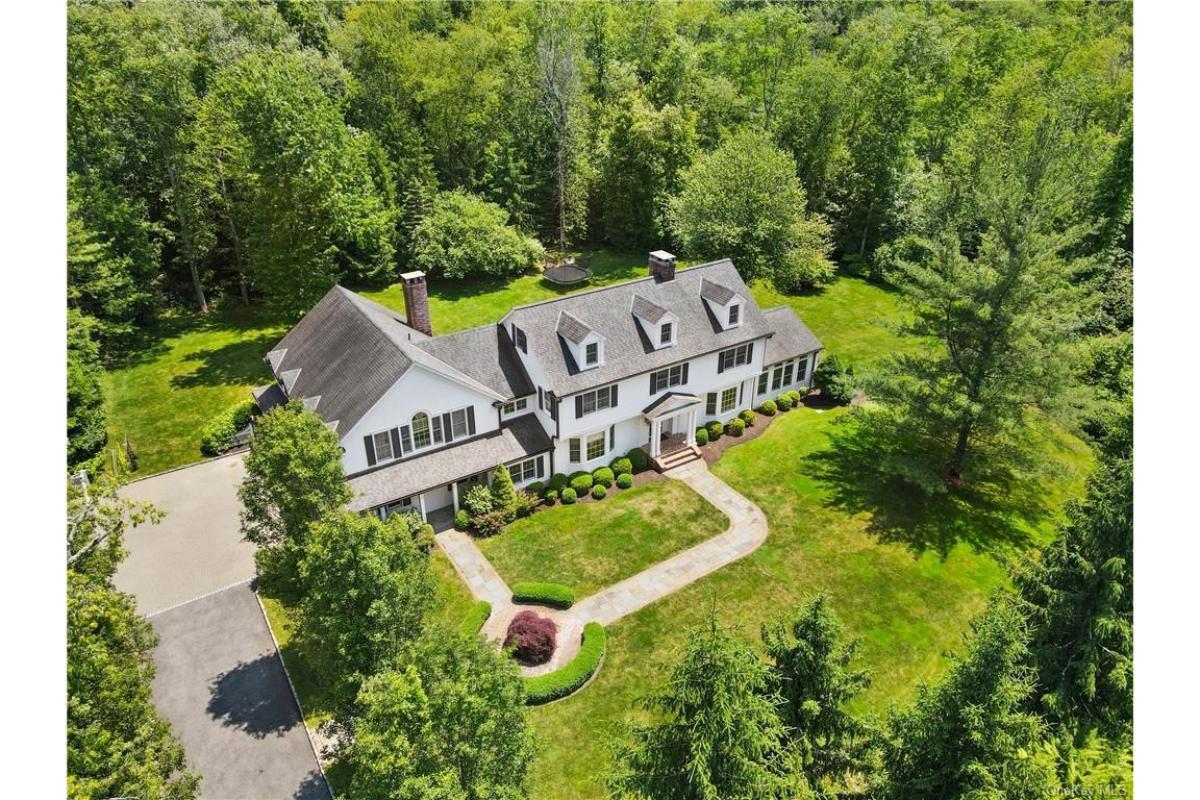 Expansive Colonial Retreat Nestled in Nature