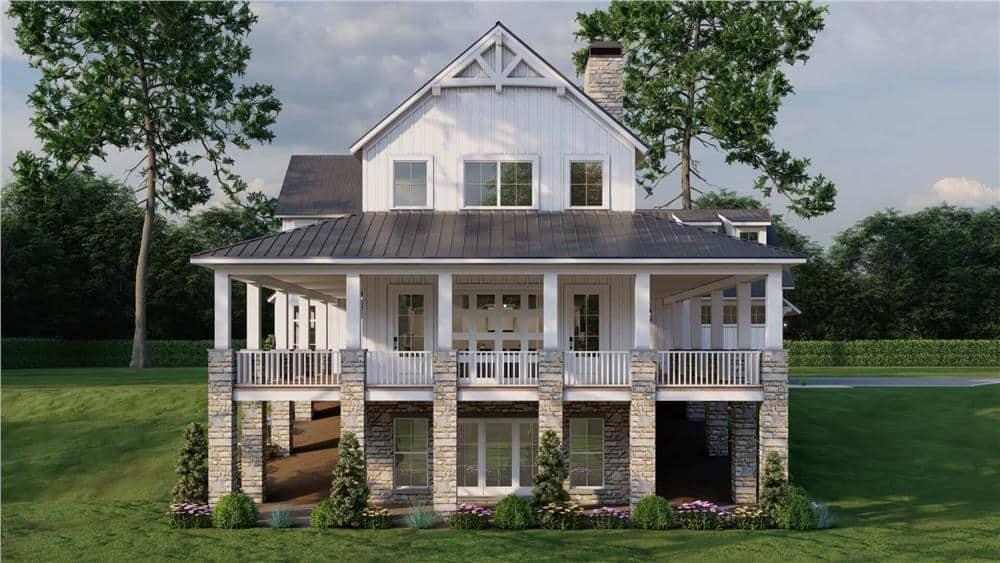 Charming Farmhouse with Wraparound Porch and Stone Accents