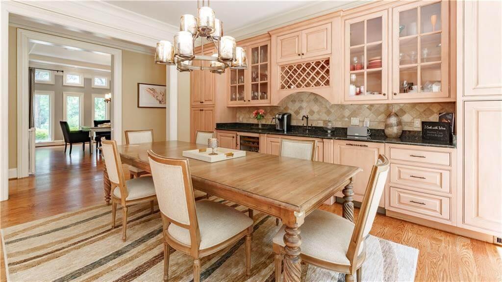 Notice the Classic Built-In Cabinetry in This Elegant Dining Area