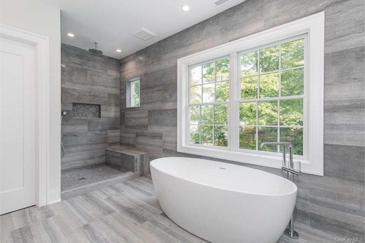 Wow, Look at This Modern Bathroom with a Freestanding Tub and Textured Walls