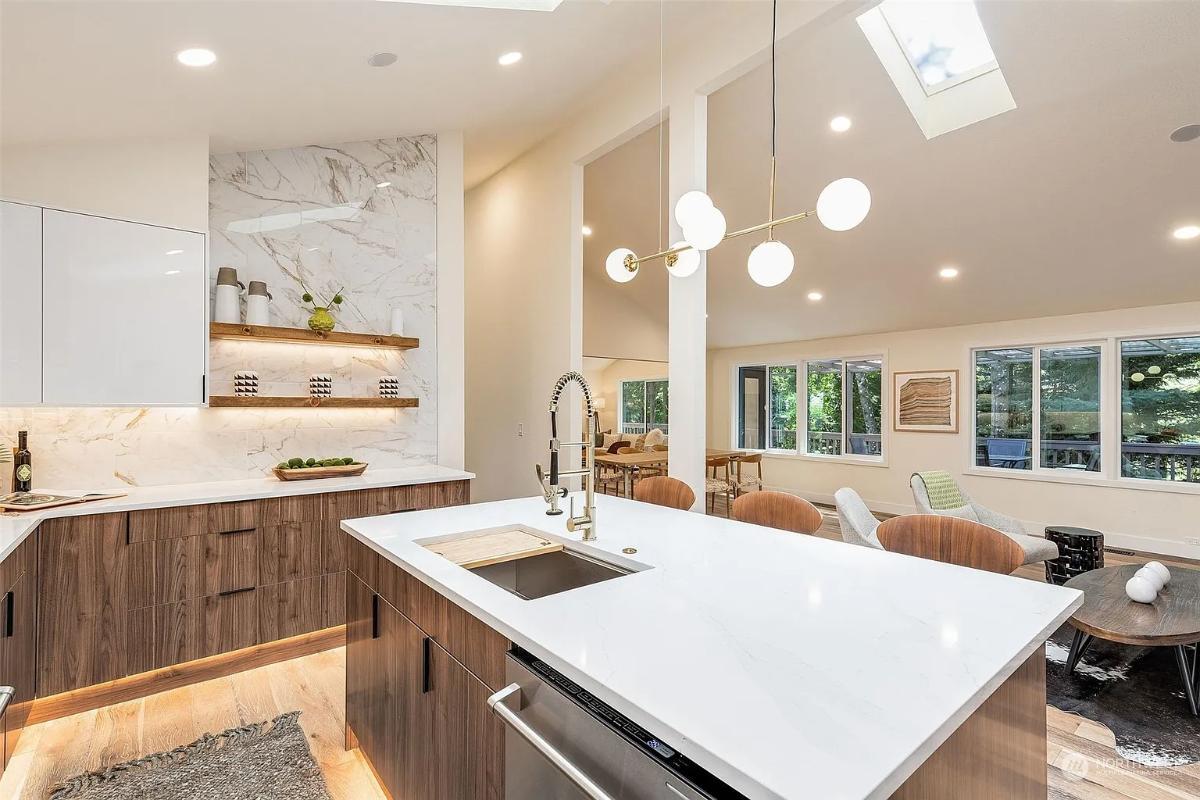 Notice the Open Shelving Highlighted by Under-Cabinet Lighting in This Sleek Kitchen