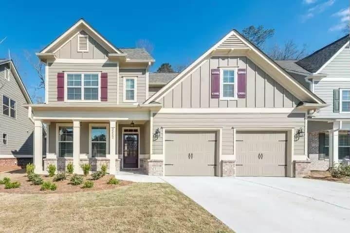 Charming Family Home with Dual Garage and Inviting Front Porch