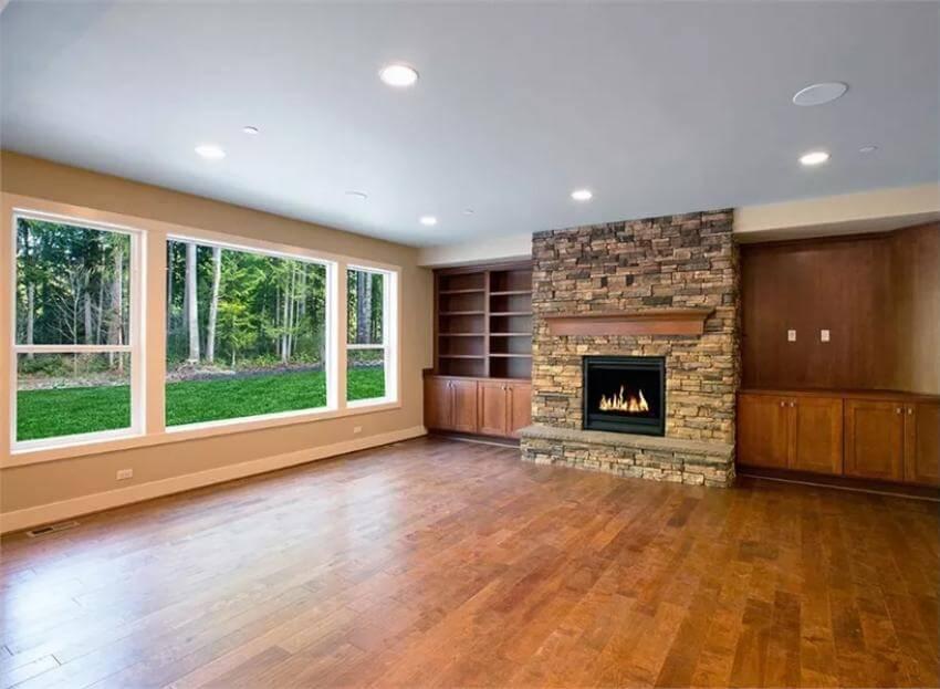 Notice the Stone Fireplace Anchoring This Craftsman Living Room