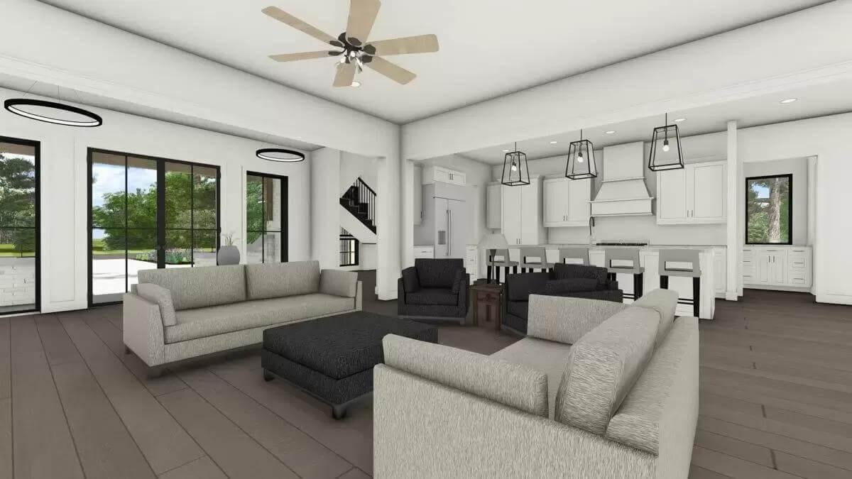 Relax in This Spacious Living Area with Expansive Glass Doors