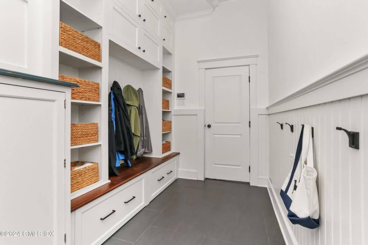 Organized Craftsman Mudroom with Built-In Storage and Hooks