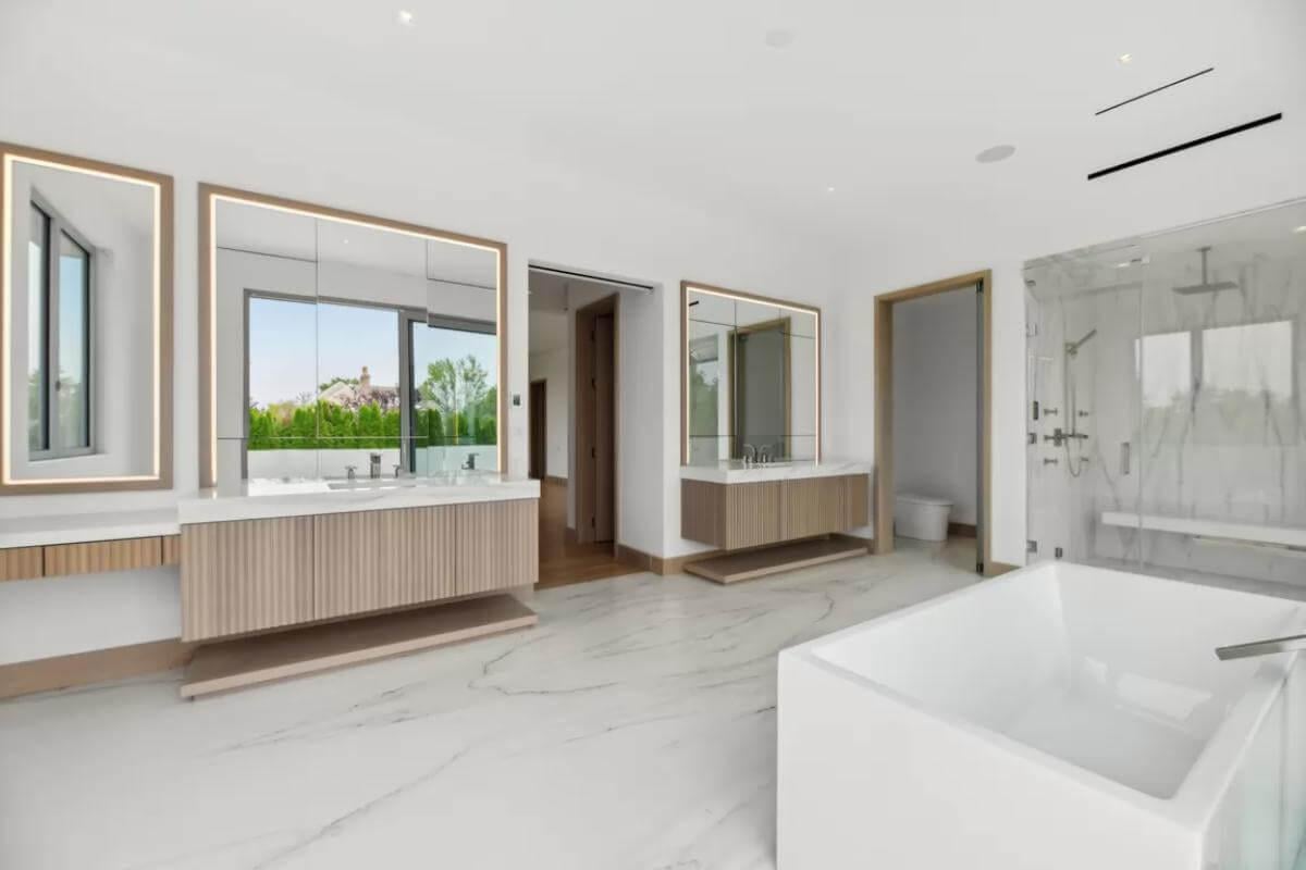 Modern Serenity: Freestanding Tub and Marble Shower in Harmony