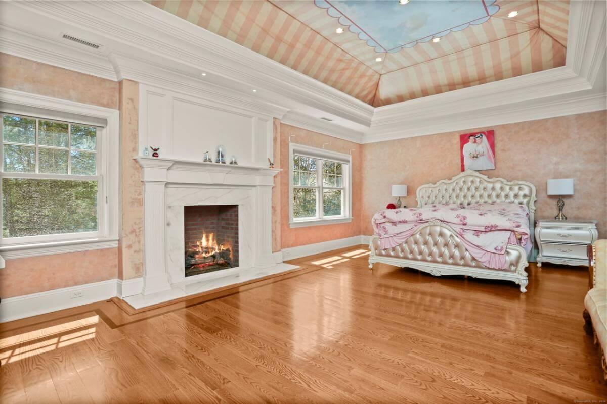 Step Into This Luxurious Bedroom with a Striking Painted Ceiling