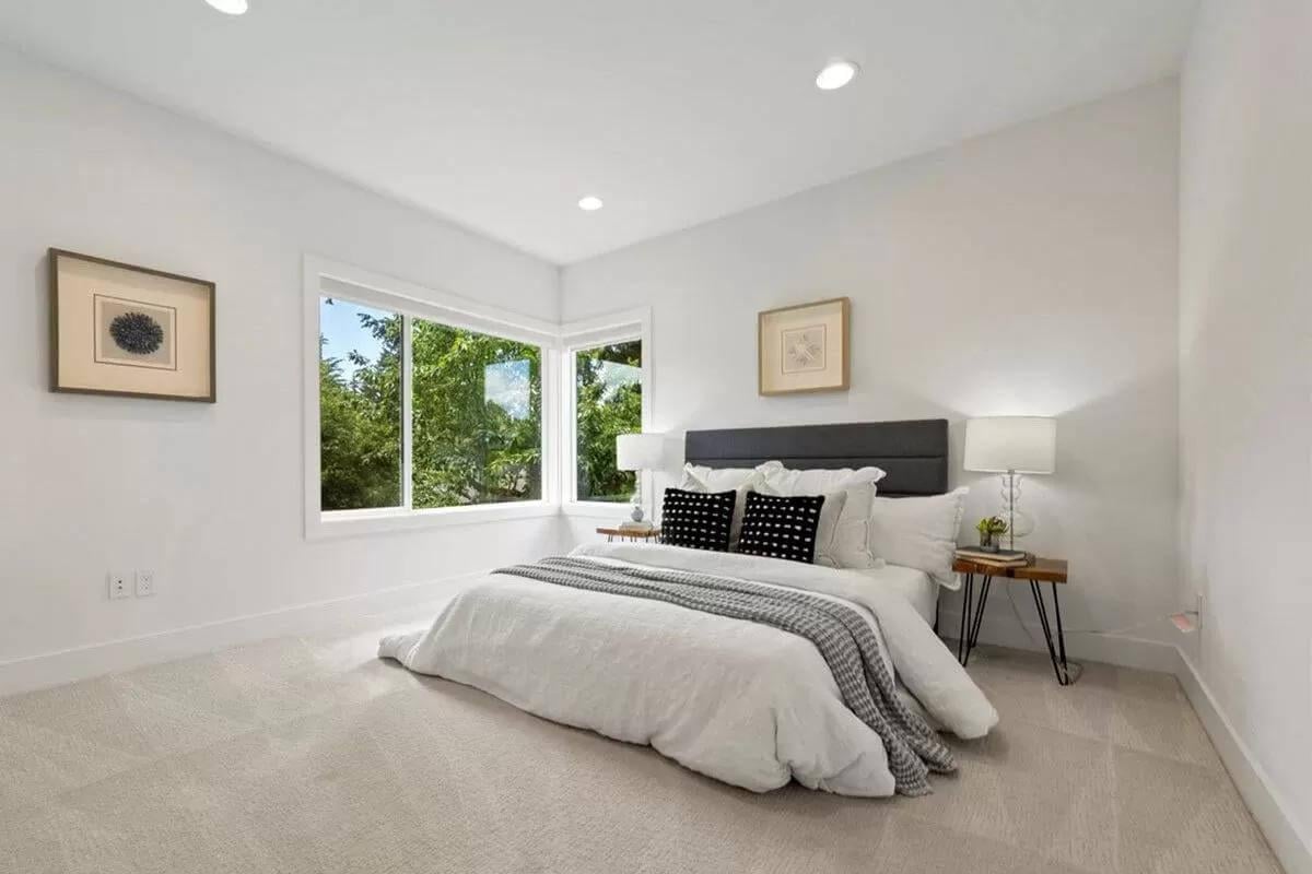 Serene Bedroom with Nature Views and Minimalist Charm