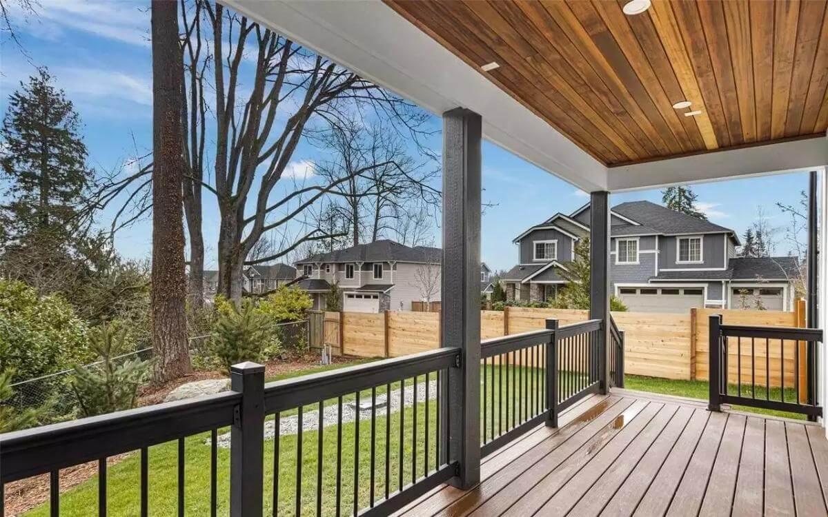 Wow, Enjoy the Natural Beauty from This Covered Porch with Wood Ceiling