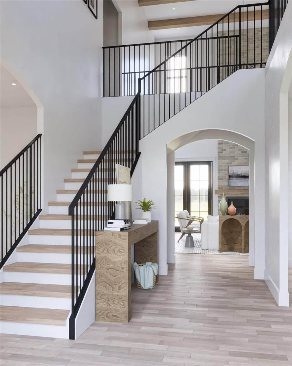Notice the Contrast in This Open Foyer with Sleek Railings