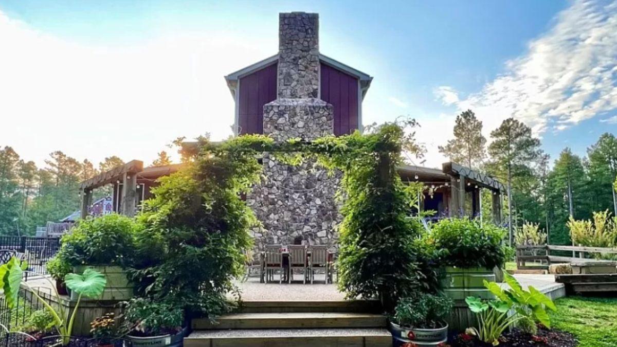 Experience the Enchanting Patio with Its Majestic Stone Chimney
