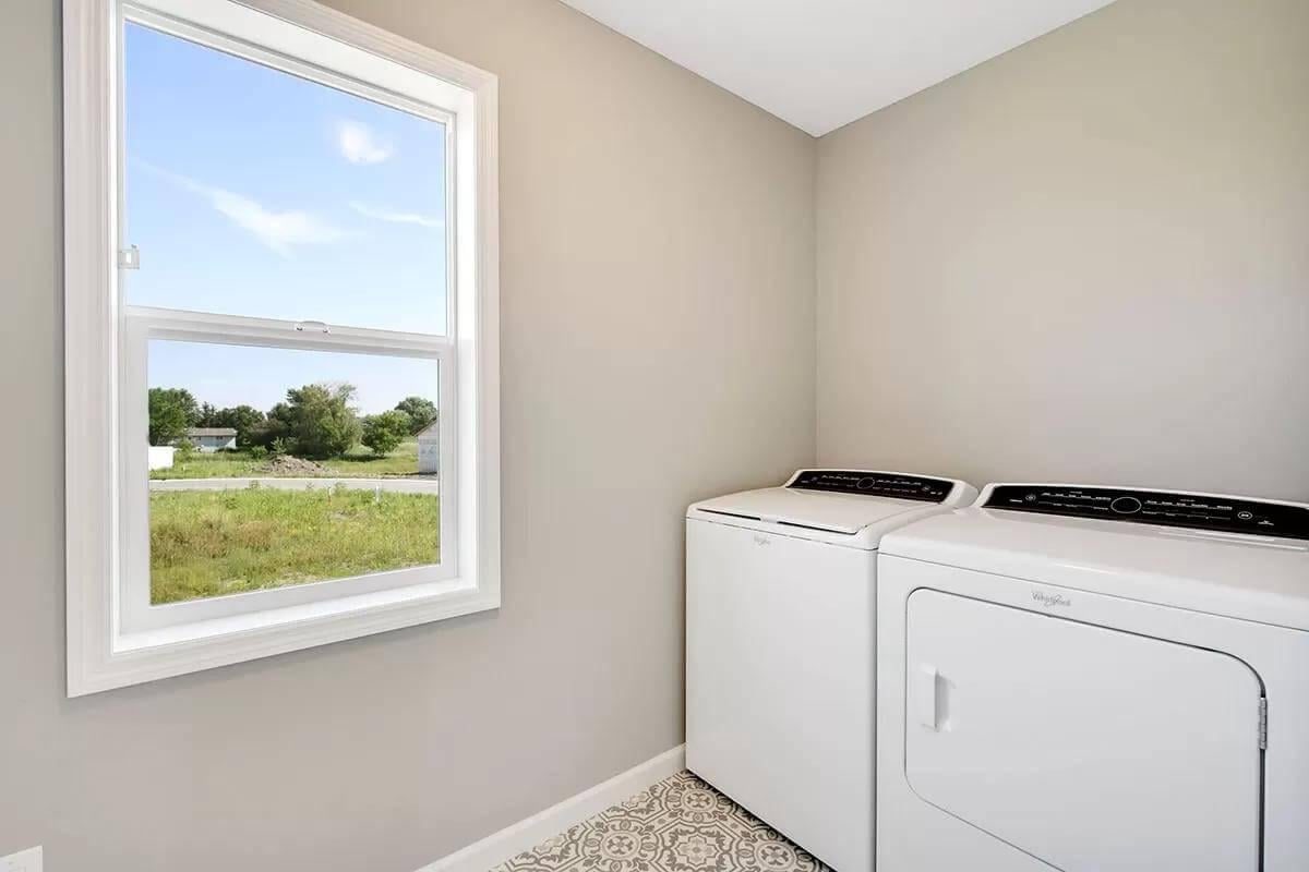 Functional Laundry Room with Scenic Window View