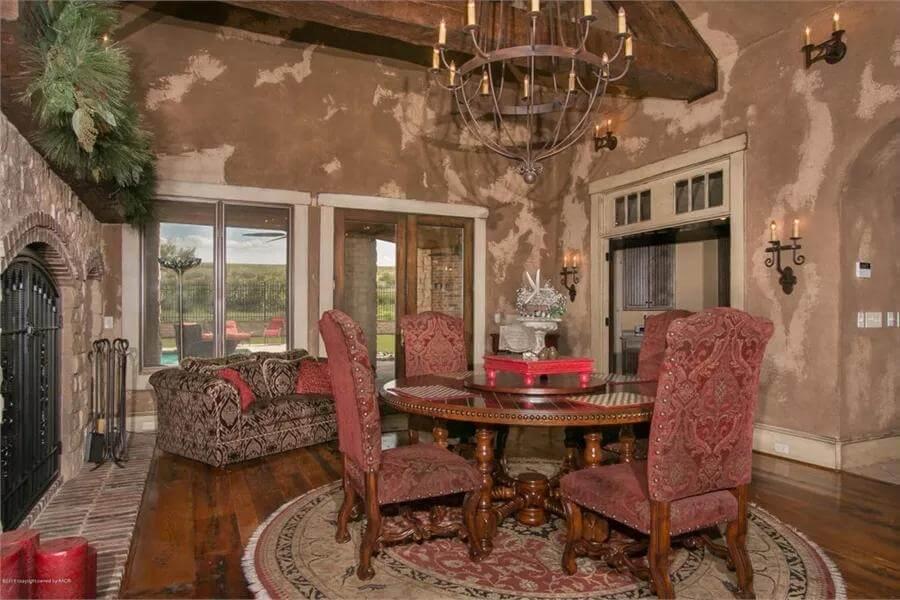 Step Into This Dining Room with a Rustic Distressed Wall Finish