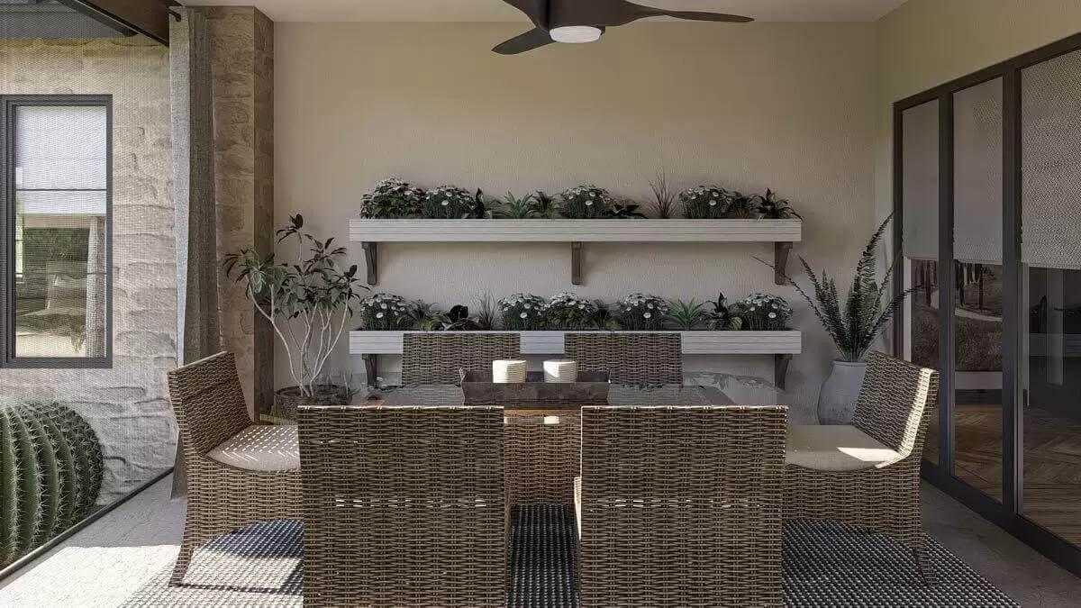 Outdoor Dining with Wicker Charm and Vertical Plant Wall