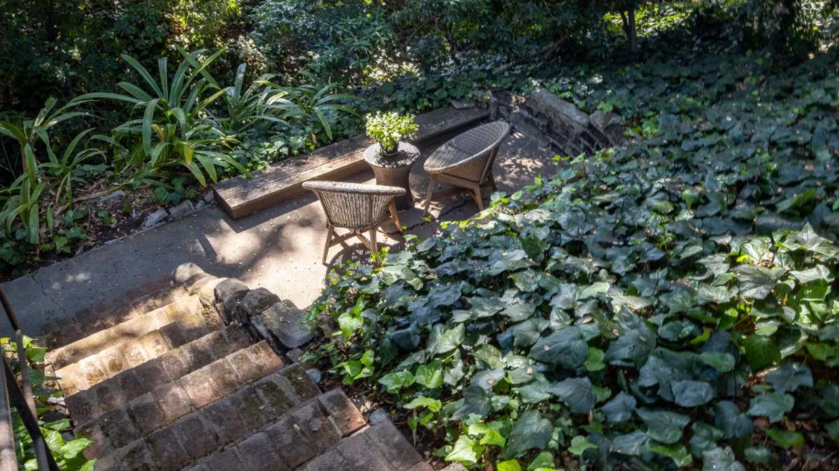 Relax in This Secluded Garden Hideaway with Stone Steps