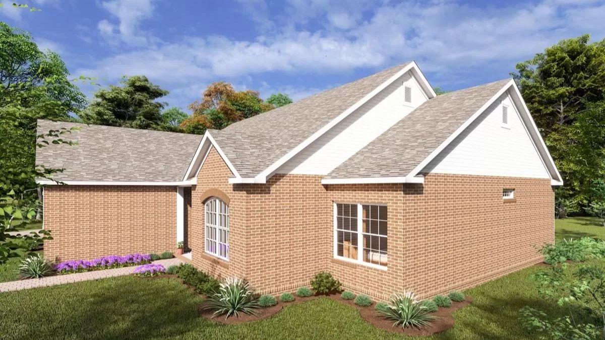 Check Out the Gable Roofs Adding Dimension to This Brick Home