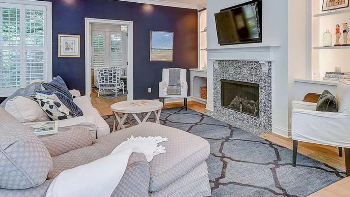 Cozy Living Room with Intricate Tile Fireplace