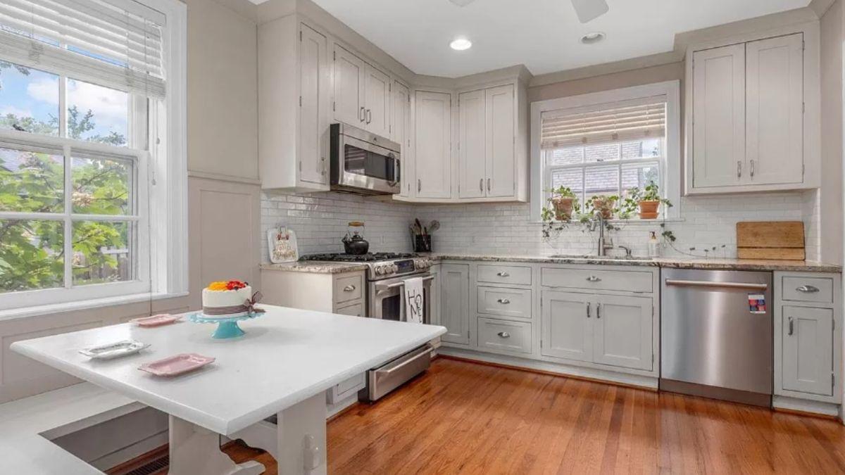 Charming Kitchen Nook with Built-in Bench and Granite Accents