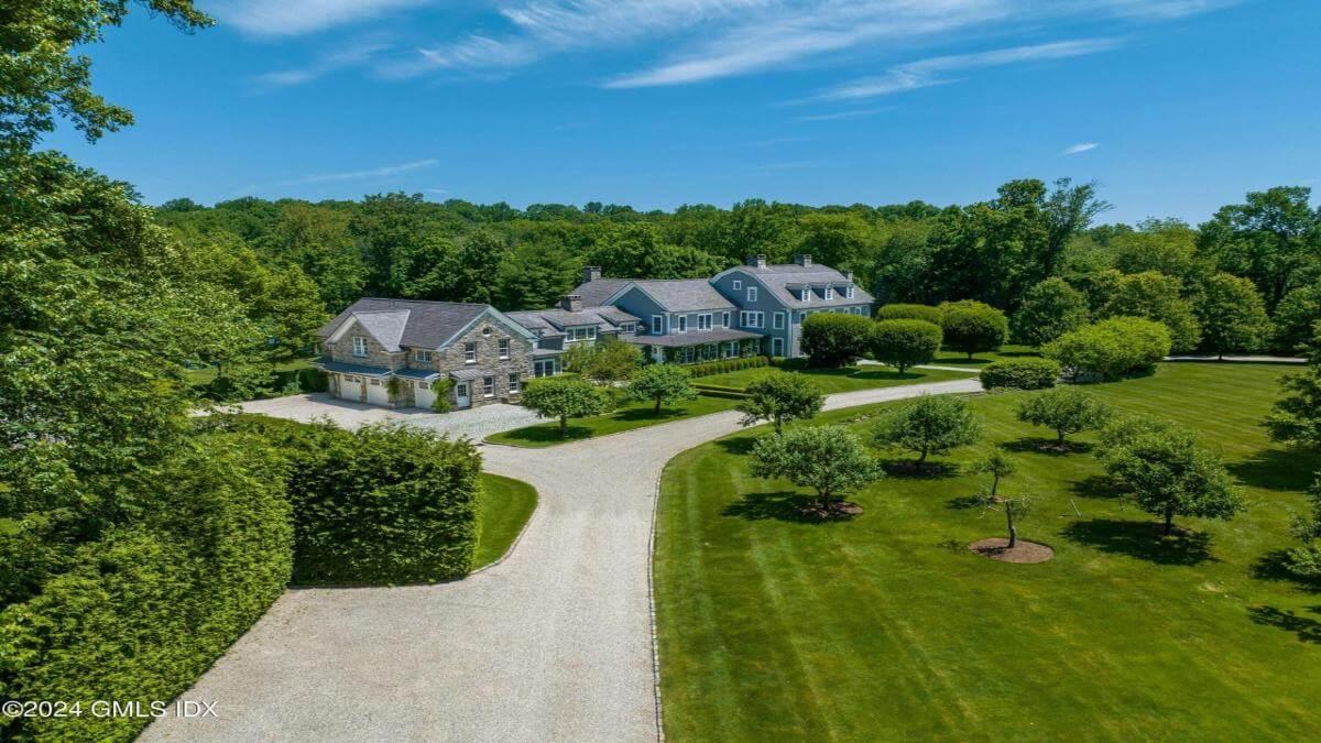 Explore the Sweeping Driveway Leading to this Elegant Estate
