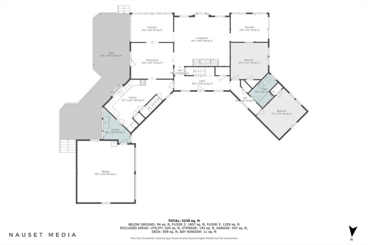 Spacious Layout with Sunrooms and Expansive Deck